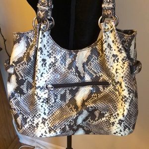Nicole Miller faux snakeskin lined purse